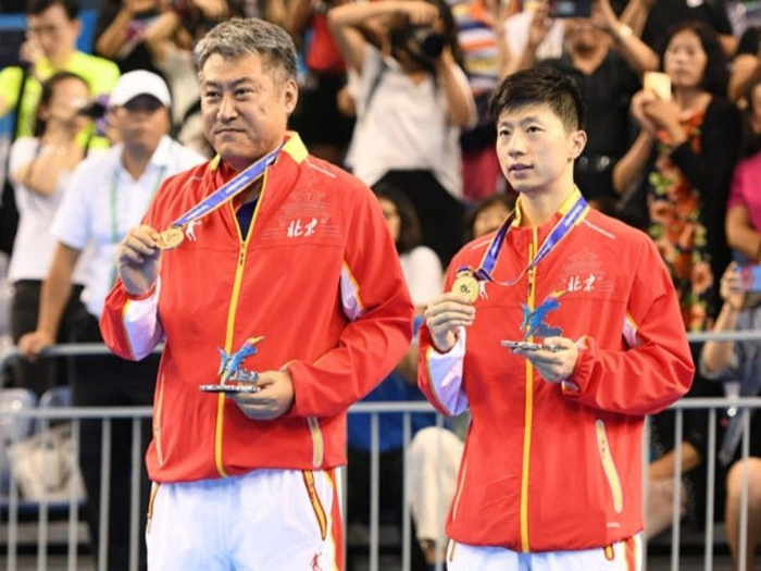 日本队力克中国队,马龙刷新纪录 日本队力克中国队,马龙刷新纪录