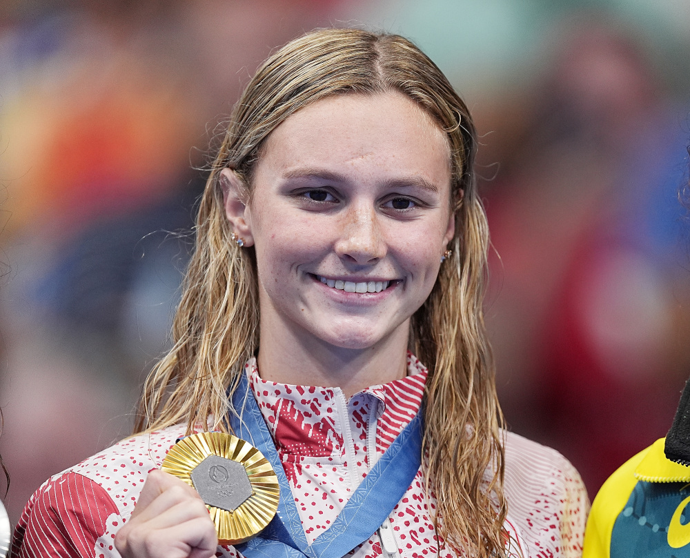 荷兰运动员在游泳比赛中打破记录，夺金